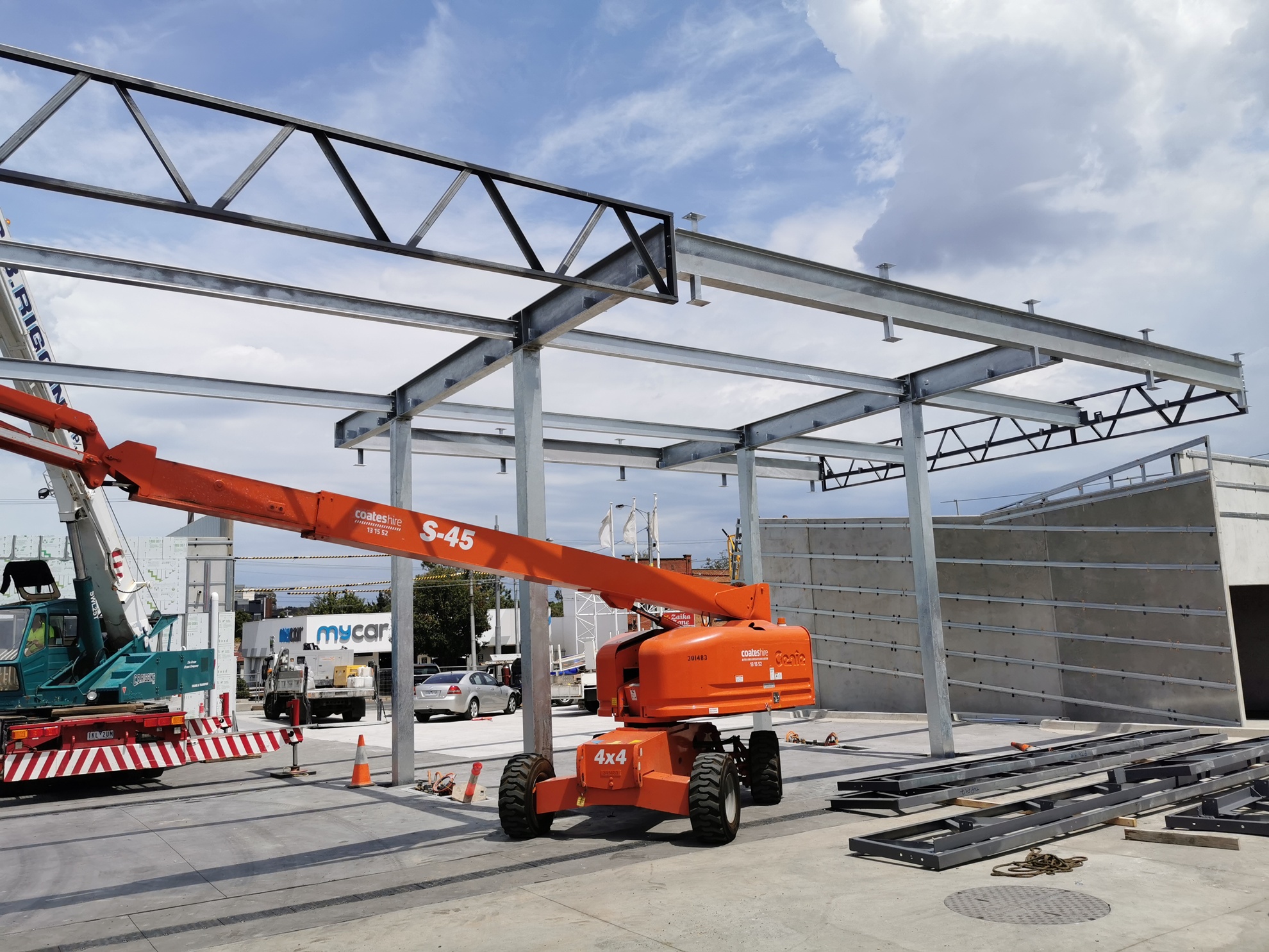 Steel fabricator working on structural beam